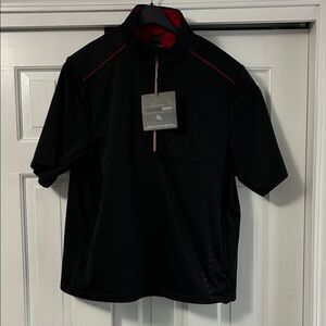 Greg Norman Collection Lg Black Waterproof
Wind Resistant short sleeve Pullover
